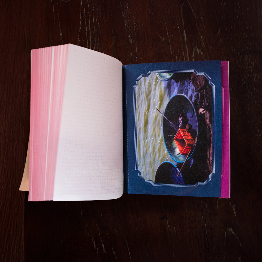 Luru Magazines A6 notebook with a dot grid matrix and original Luru postcards