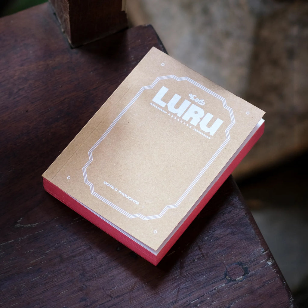 Luru Magazines A6 notebook with a dot grid matrix and original Luru postcards