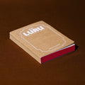 Luru Magazines A6 notebook with a dot grid matrix and original Luru postcards