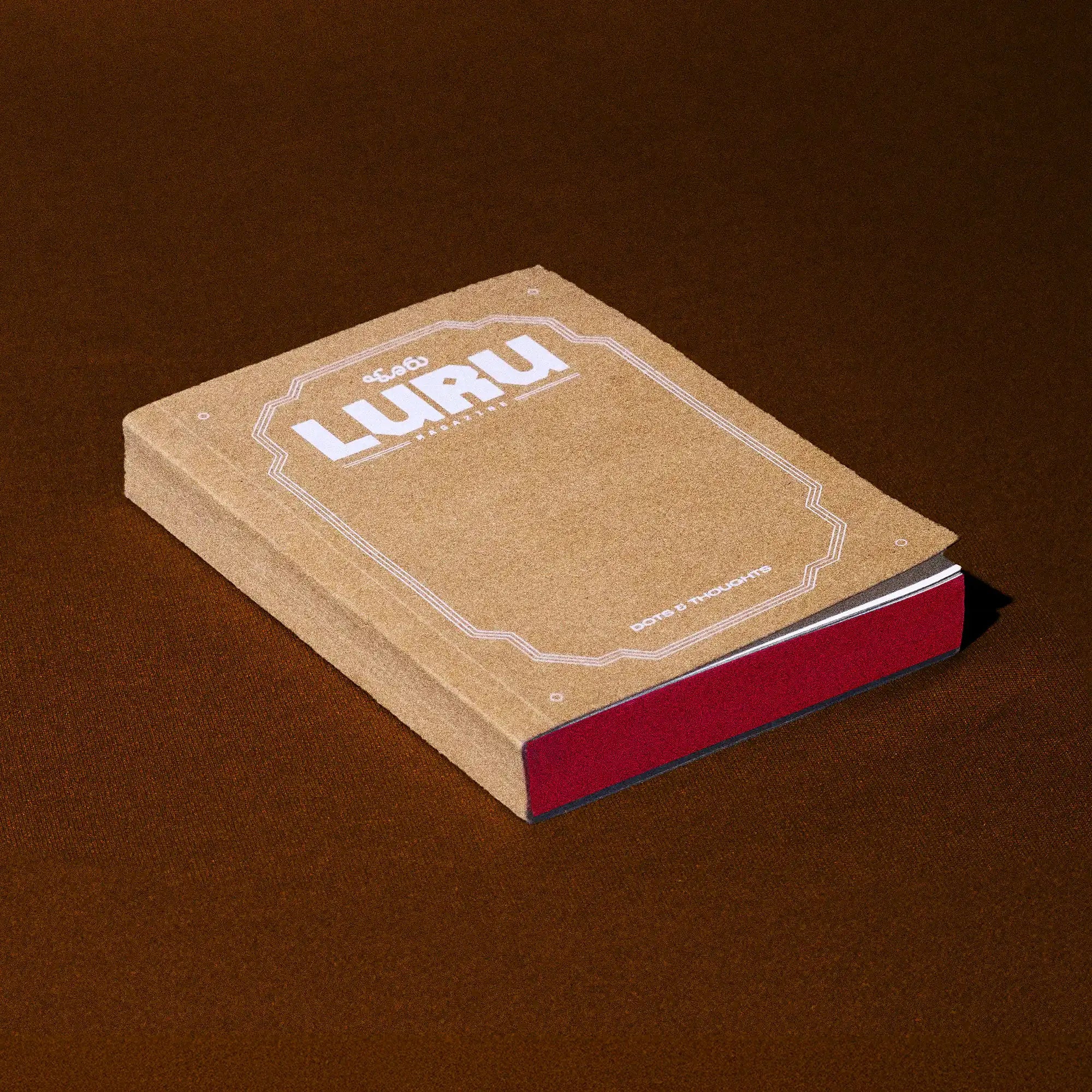 Luru Magazines A6 notebook with a dot grid matrix and original Luru postcards